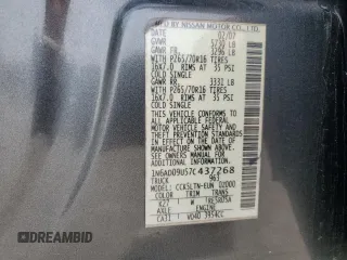 2007 Nissan Frontier SE z VIN 1N6AD09U57C437268, wystawiony jako Copart lot #49835405 z przebiegiem 145 232 mil mil oraz Szkoda całkowita • Salvage title. Historia ofert i sprzedaży dostępna na DreamBid. Obrazek 13.