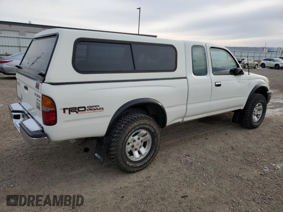 1998 Toyota Tacoma with VIN 4TAWN72N8WZ113174, listed as a Copart auction lot 84641064 with 148,221 mi miles and Salvage Title. Bid and sale history available at DreamBid. Image 3.