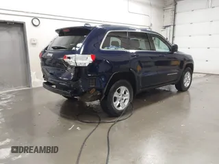 2016 Jeep Grand Cherokee Laredo with VIN 1C4RJFAG5GC434359, listed as a IAAI auction lot 42555310 with 128,350 mi miles and . Bid and sale history available at DreamBid. Image 4.