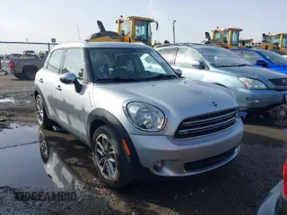 2015 MINI Countryman with VIN WMWZB3C56FWR46360, listed as a IAAI auction lot 41691359 with 88,305 mi miles and . Bid and sale history available at DreamBid. Image 1.