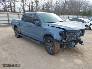 2023 Ford F-150 Lightning Pro with VIN 1FT6W1EVXPWG34958, listed as a IAAI auction lot 41732898 with 10,573 mi miles. Bid and sale history available at carsss.com. Image 1.