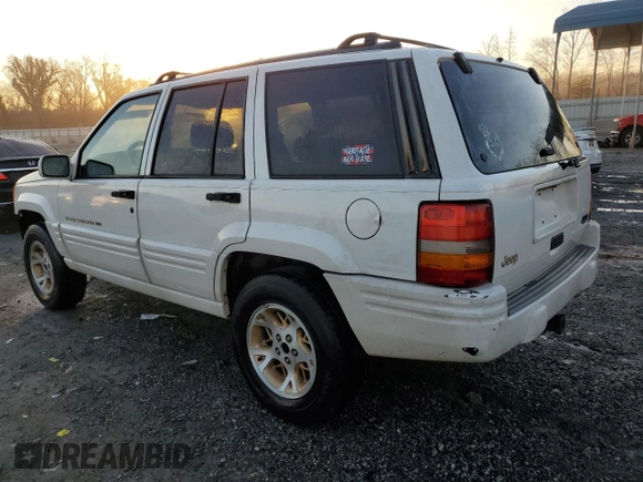 1996 Jeep Grand Cherokee z VIN 1J4FX78S6TC221815, wystawiony jako Copart lot #44000615 z przebiegiem 287 308 mil mil oraz Szkoda całkowita • Salvage title. Historia ofert i sprzedaży dostępna na DreamBid. Obrazek 2.