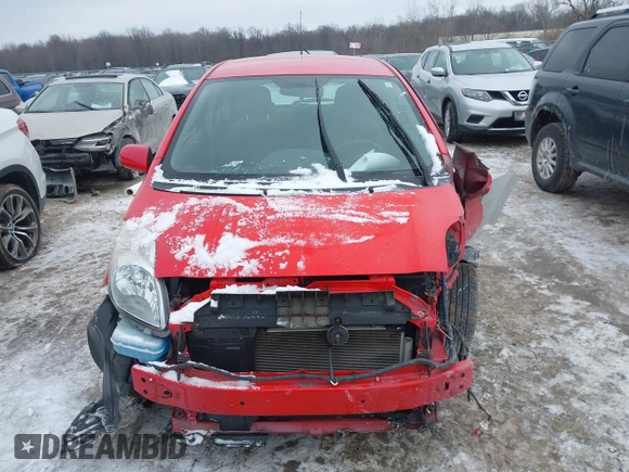 2011 Toyota Yaris with VIN JTDJT4K34B5329980, listed as a IAAI auction lot 41393540 with 84,987 mi miles. Bid and sale history available at carsss.com. Image 13.