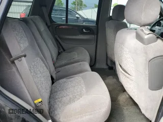 2003 GMC Envoy SLE z VIN 1GKDT13S432160651, wystawiony jako Copart lot #56938205 z przebiegiem 197 593 mil mil oraz Szkoda całkowita • Salvage title. Historia ofert i sprzedaży dostępna na DreamBid. Obrazek 11.