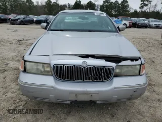 2000 Mercury Grand Marquis LS z VIN 2MEFM75W4YX722958, wystawiony jako Copart lot #47927745 z przebiegiem 148 461 mil mil oraz Szkoda całkowita • Salvage title. Historia ofert i sprzedaży dostępna na DreamBid. Obrazek 5.
