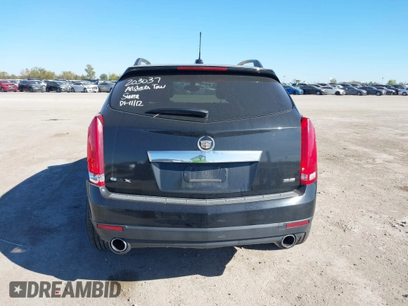 2015 Cadillac SRX with VIN 3GYFNAE30FS573125, listed as a IAAI auction lot 40972187 with 122,612 mi miles and . Bid and sale history available at DreamBid. Image 16.