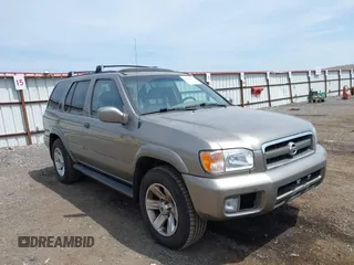 2003 Nissan Pathfinder LE z VIN JN8DR09Y23W825365, wystawiony jako IAAI lot #42494873 z przebiegiem 161 285 mil mil oraz . Historia ofert i sprzedaży dostępna na DreamBid. Obrazek 1.