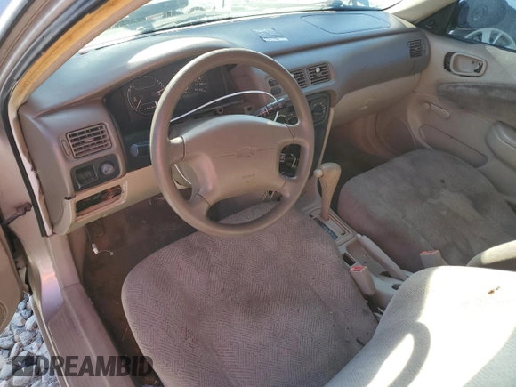 2000 Chevrolet Prizm z VIN 1Y1SK5284YZ407566, wystawiony jako Copart lot #86148464 z przebiegiem 193 844 mil mil oraz Szkoda całkowita • Salvage title. Historia ofert i sprzedaży dostępna na DreamBid. Obrazek 8.