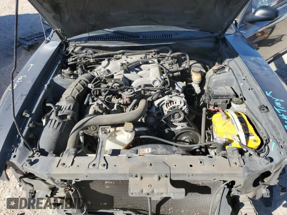 2004 Ford Mustang Deluxe with VIN 1FAFP44404F117628, listed as a Copart auction lot 81377524 with 39,697 mi miles and Salvage Title. Bid and sale history available at carsss.com. Image 11.