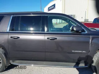 2015 GMC Yukon XL SLT with VIN 1GKS1HKC0FR675450, listed as a IAAI auction lot 41558343 with 187,814 mi miles. Bid and sale history available at carsss.com. Image 14.