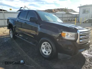2016 GMC Canyon 2WD SLE with VIN 1GTG5CE35G1256661, listed as a Copart auction lot 82244644 with 104,496 mi miles and Clean Title. Bid and sale history available at carsss.com. Image 4.