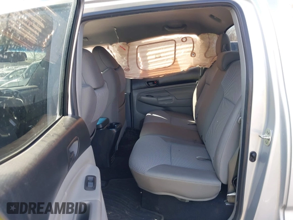 2013 Toyota Tacoma with VIN 3TMMU4FN8DM054973, listed as a IAAI auction lot 41659232 with 113,734 mi miles. Bid and sale history available at carsss.com. Image 8.