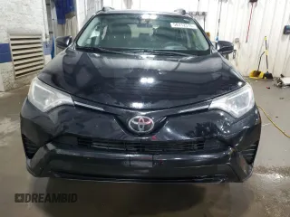 2017 Toyota RAV4 LE with VIN 2T3BFREV3HW617738, listed as a Copart auction lot 58712515 with 117,310 mi miles and Salvage title. Bid and sale history available at DreamBid. Image 5.
