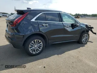 2024 Cadillac XT4 AWD Premium Luxury with VIN 1GYFZDR49RF112460, listed as a Copart auction lot 67183524 with 12,396 mi miles and Salvage title. Bid and sale history available at DreamBid. Image 3.