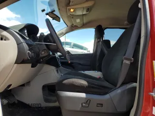 2012 Dodge Grand Caravan SXT with VIN 2C4RDGCG4CR196659, listed as a Copart auction lot 54795505 with 138,576 mi miles and Clean Title. Bid and sale history available at DreamBid. Image 7.