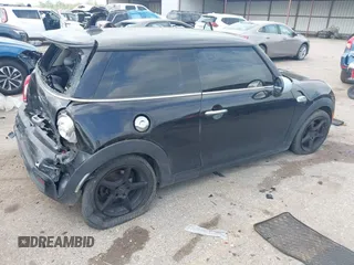 2019 MINI Hardtop Cooper S z VIN WMWXP7C56K2A49415, wystawiony jako IAAI lot #41952188 z przebiegiem 143 633 mil mil oraz . Historia ofert i sprzedaży dostępna na DreamBid. Obrazek 4.