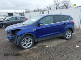 2013 Ford Escape SEL with VIN 1FMCU9H92DUA47288, listed as a IAAI auction lot 41912588 with 165,728 mi miles. Bid and sale history available at carsss.com. Image 2.