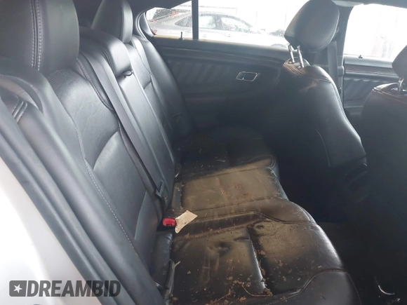 2014 Ford Taurus Limited с VIN 1FAHP2F89EG186147, выставлен на аукционе IAAI как лот 42228000 с пробегом 179 863 миль миль и . История ставок и продаж доступна на DreamBid. Изображение 8.