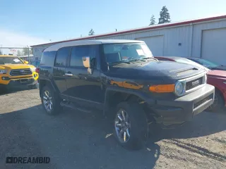 2008 Toyota FJ Cruiser with VIN JTEBU11F780104062, listed as a IAAI auction lot 41010076 with 220,975 mi miles. Bid and sale history available at carsss.com. Image 1.