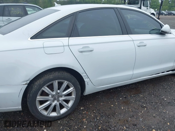 2014 Audi A6 Premium Plus z VIN WAUFGAFC4EN081900, wystawiony jako IAAI lot #42268150 z przebiegiem 150 238 mil mil oraz . Historia ofert i sprzedaży dostępna na DreamBid. Obrazek 19.