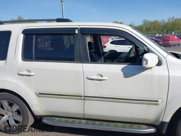 2013 Honda Pilot Touring with VIN 5FNYF4H97DB069979, listed as a IAAI auction lot 42133922 with 276,574 mi miles and . Bid and sale history available at carsss.com. Image 13.