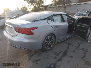 2018 Nissan Maxima SL with VIN 1N4AA6AP5JC387702, listed as a IAAI auction lot 41229493 with 111,693 mi miles. Bid and sale history available at carsss.com. Image 4.