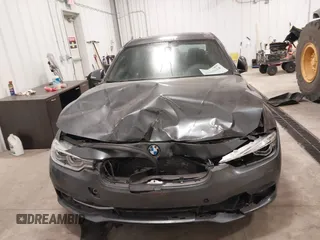 2018 BMW 3 Series 330i xDrive with VIN WBA8D9G59JNU68145, listed as a IAAI auction lot 41079634 with 48,872 mi miles and . Bid and sale history available at carsss.com. Image 12.