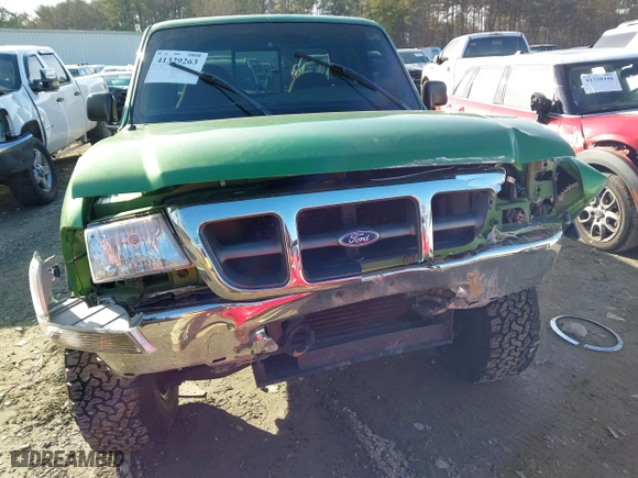 1999 Ford Ranger XLT with VIN 1FTZR15X3XPA13058, listed as a IAAI auction lot 41329263 with 96,926 mi miles. Bid and sale history available at carsss.com. Image 6.