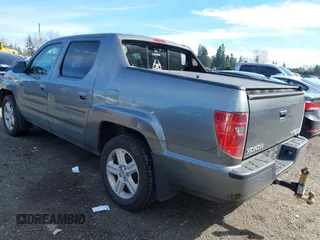 2009 Honda Ridgeline RTL with VIN 5FPYK16599B100707, listed as a IAAI auction lot 41877598 with 130,622 mi miles and . Bid and sale history available at DreamBid. Image 3.