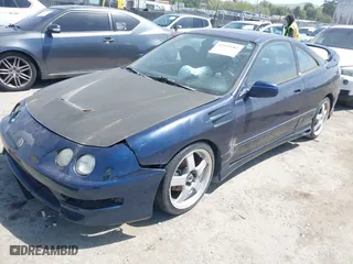 1998 Acura Integra LS with VIN JH4DC4453WS008210, listed as a IAAI auction lot 42099982 with 143,043 mi miles. Bid and sale history available at carsss.com. Image 2.