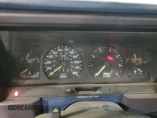 1991 Dodge Spirit z VIN 1B3XA46K9MF628235, wystawiony jako Copart lot #83581274 z przebiegiem 117 774 mil mil oraz Szkody całkowita. Historia ofert i sprzedaży dostępna na DreamBid. Obrazek 9.