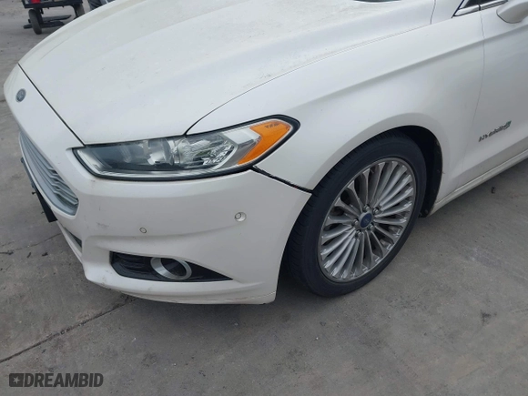 2014 Ford Fusion Titanium Hybrid with VIN 3FA6P0RU6ER115985, listed as a IAAI auction lot 41870494 with 132,321 mi miles. Bid and sale history available at carsss.com. Image 6.