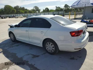 2015 Volkswagen Jetta S with VIN 3VW2K7AJ9FM323047, listed as a Copart auction lot 59098565 with 169,648 mi miles and Salvage title. Bid and sale history available at DreamBid. Image 2.