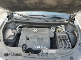 2012 Cadillac SRX z VIN 3GYFNGE32CS531568, wystawiony jako Copart lot #53369795 z przebiegiem 172 497 mil mil oraz Szkoda całkowita • Salvage title. Historia ofert i sprzedaży dostępna na DreamBid. Obrazek 12.