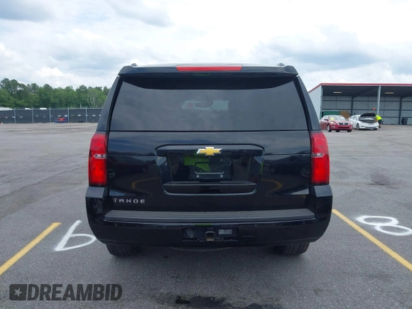 2015 Chevrolet Tahoe LT with VIN 1GNSCBKC4FR145119, listed as a IAAI auction lot 42309931 with 99,408 mi miles and . Bid and sale history available at DreamBid. Image 16.
