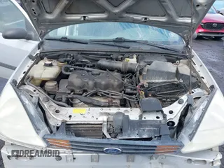 2001 Ford Focus LX with VIN 1FAFP33P31W297608, listed as a IAAI auction lot 41663965 with 142,898 mi miles and . Bid and sale history available at carsss.com. Image 10.