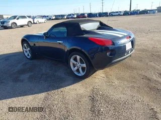2006 Pontiac Solstice z VIN 1G2MB33B56Y111717, wystawiony jako IAAI lot #41988139 z przebiegiem 70 783 mil mil oraz . Historia ofert i sprzedaży dostępna na DreamBid. Obrazek 3.