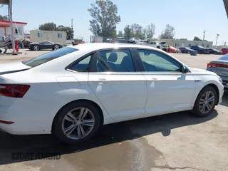 2020 Volkswagen Jetta S z VIN 3VWCB7BU8LM008555, wystawiony jako IAAI lot #41986229 z przebiegiem 54 251 mil mil oraz . Historia ofert i sprzedaży dostępna na DreamBid. Obrazek 13.