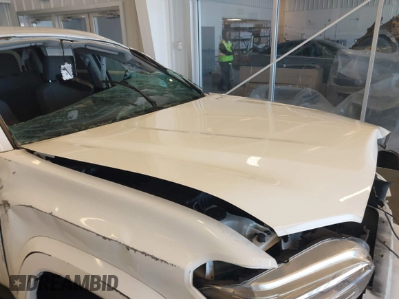 2020 Toyota Tacoma SR5 with VIN 3TMAZ5CN5LM124703, listed as a IAAI auction lot 41017478 with 47,627 mi miles and . Bid and sale history available at DreamBid. Image 6.