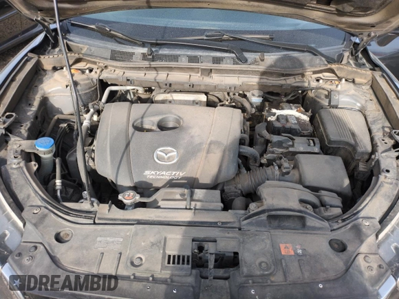 2015 Mazda CX-5 Grand Touring with VIN JM3KE4DY3F0495411, listed as a Copart auction lot 50077765 with 136,191 mi miles and Salvage Title. Bid and sale history available at DreamBid. Image 11.