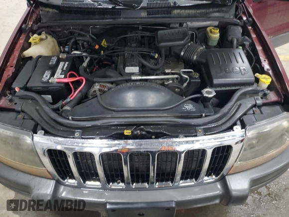 2001 Jeep Grand Cherokee Laredo with VIN 1J4GW48S11C618478, listed as a Copart auction lot 57889965 with Not provided miles and Clean title. Bid and sale history available at DreamBid. Image 12.