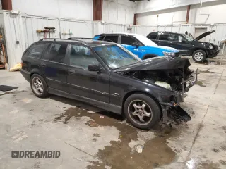 1997 BMW M3 with VIN WBACE11020EZ24250, listed as a Copart auction lot 85107784 with 147,369 mi miles and Clean title. Bid and sale history available at DreamBid. Image 4.