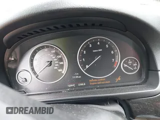 2013 BMW 5 Series 528i xDrive with VIN WBAXH5C56DDW13425, listed as a IAAI auction lot 41927530 with 120,847 mi miles. Bid and sale history available at carsss.com. Image 7.