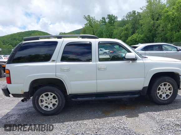 2003 Chevrolet Tahoe Z71 z VIN 1GNEK13Z23R230226, wystawiony jako IAAI lot #42252874 z przebiegiem 251 268 mil mil oraz . Historia ofert i sprzedaży dostępna na DreamBid. Obrazek 13.