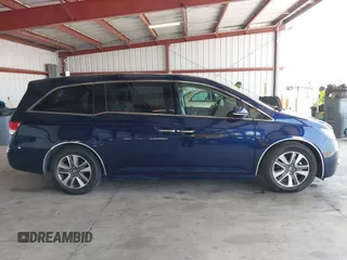 2017 Honda Odyssey Touring with VIN 5FNRL5H90HB017215, listed as a IAAI auction lot 42574528 with 61,386 mi miles and . Bid and sale history available at DreamBid. Image 13.
