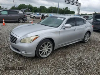 2012 Infiniti M with VIN JN1BY1AP1CM333620, listed as a Copart auction lot 60019385 with 185,459 mi miles and Salvage title. Bid and sale history available at DreamBid. Image 1.