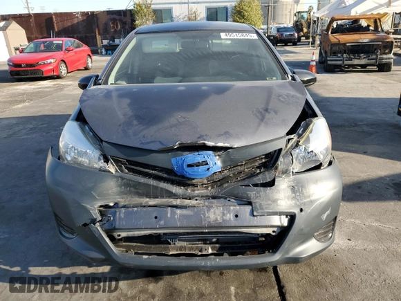 2012 Toyota Yaris L z VIN JTDKTUD33CD541021, wystawiony jako Copart lot #49515845 z przebiegiem 69 122 mil mil oraz Szkoda całkowita • Salvage title. Historia ofert i sprzedaży dostępna na DreamBid. Obrazek 5.