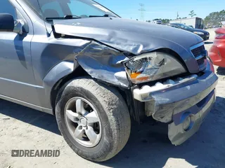 2006 Kia Sorento LX with VIN KNDJD733965596468, listed as a IAAI auction lot 41854438 with 205,028 mi miles and . Bid and sale history available at DreamBid. Image 6.