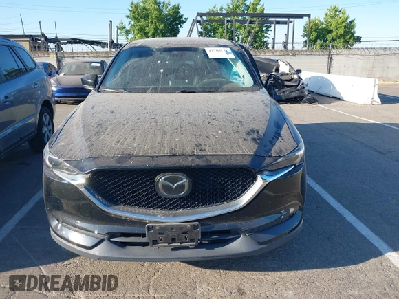 2018 Mazda CX-5 Grand Touring with VIN JM3KFBDM1J0345014, listed as a IAAI auction lot 42703926 with 151,453 mi miles and . Bid and sale history available at DreamBid. Image 12.