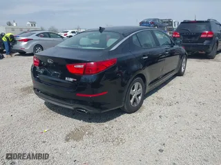2014 Kia Optima LX with VIN 5XXGM4A72EG343520, listed as a IAAI auction lot 42050562 with 126,270 mi miles. Bid and sale history available at carsss.com. Image 4.